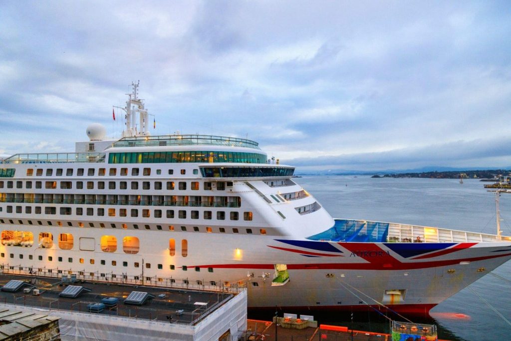 Large cruise ship docked at dusk